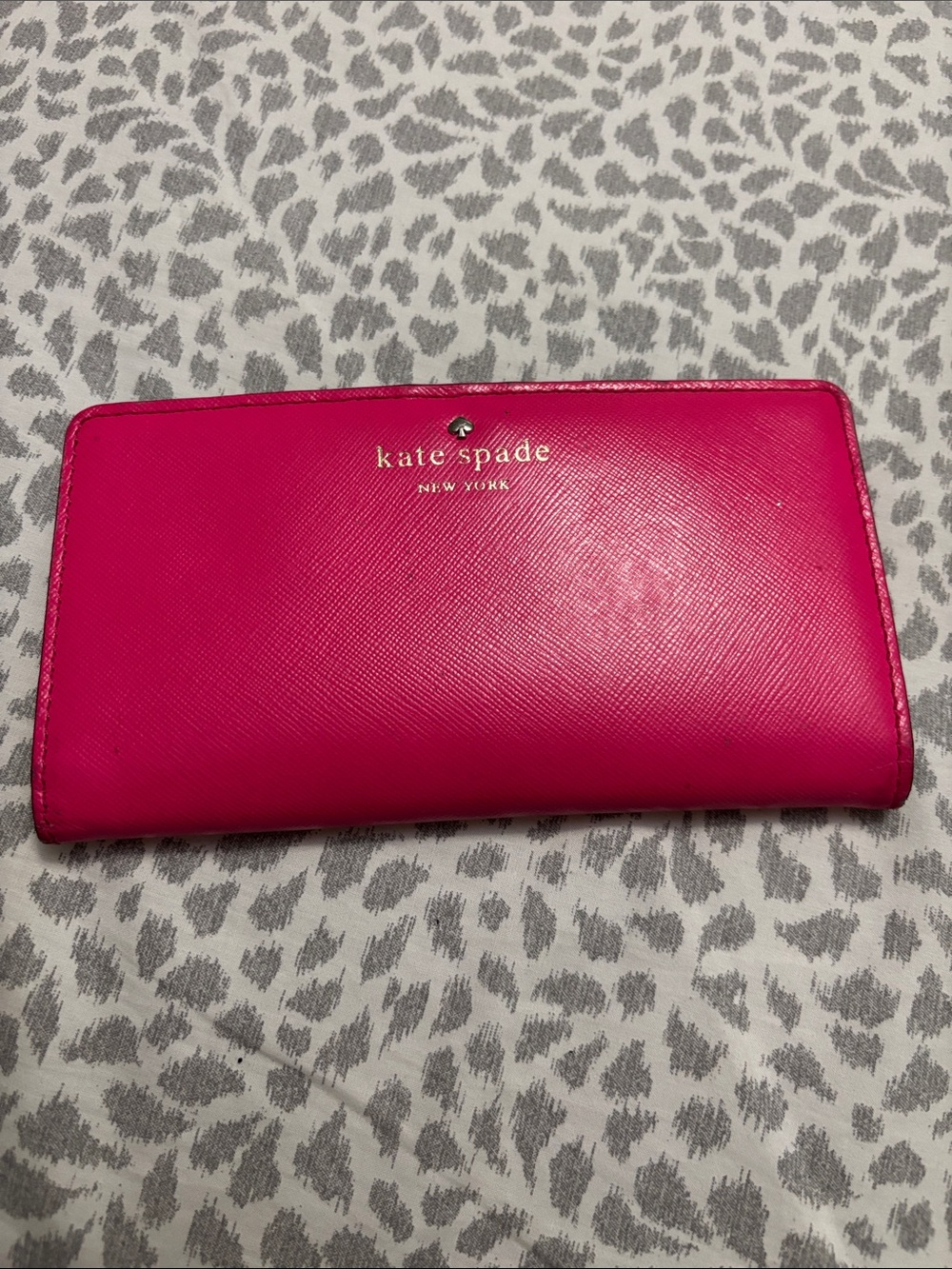 kate spade hot pink zip-around Saffiano leather wallet